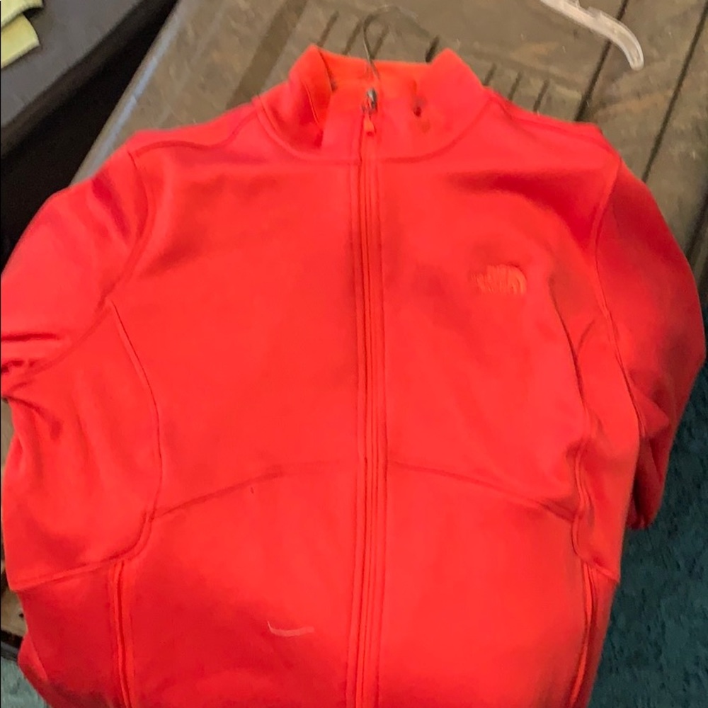 North face zip up. Never worn.